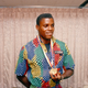 Carl Lewis shows off his 100 meter gold after Ben Johnson was stripped of his medal. Photo: Lennox McLendon/AP Images.